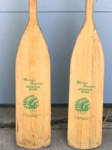 lot 146 image: Pair of wooden canoe paddles