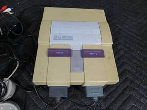 lot 204 image: Super nintendo w games