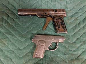 lot 273 image: 2 antique toy pistols