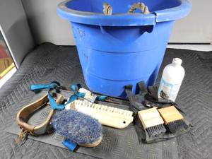 lot 347 image: Oats bucket of horse supplies and rubber step covers