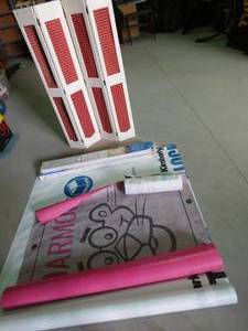 lot 352 image: Vinyl house wrap, divider, and blinds