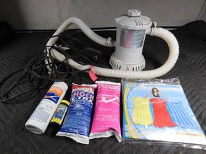 lot 384 image: Pool pump and chemicals, pool air mattress