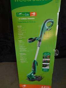 lot 390 image: New in the box electric weed eater