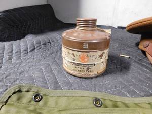 lot 404 image: WW2 japenese gas mask filter, military gun cleaning kit, ammo cloth case, U.S. army enlisted mens visor