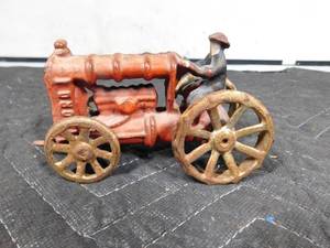 lot 428 image: Vintage cast iron toy tractor