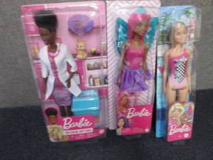 3 Barbies...
