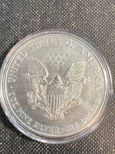 lot 25 image: 1999 AMERICAN SILVER EAGLE IN AIRTITE