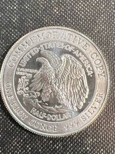 lot 31 image: 1 TROY OZ .999 FINE SILVER WALKING LIBERTY DESIGN ROUND