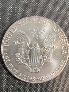 lot 43 image: 1986 AMERICAN SILVER EAGLE 1 TROY OZ .999 FINE SILVER