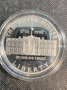 lot 50 image: 1992-W US SILVER DOLLAR WHITE HOUSE COMMEM IN AIRTITE