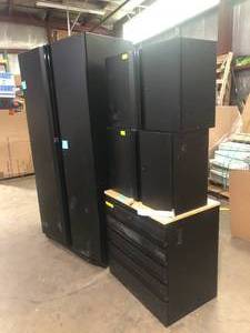 lot 10 image: Husky -Piece Pro Duty Welded Steel Garage Storage System in Black LINE-X Coating (92 in. W x 81 in. H x 24 in. D) scratched Customer Returns See Pictures