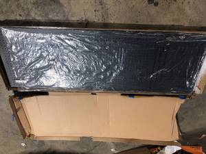 lot 18 image: Dewalt 71 in. H x 24 in. W Pegboard Black Metal Kit for DXST10000 6 ft. Industrial Storage Rack customer returns see pictures