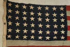 lot 36 image: Old Weathered 48 Star Embriodered American Flag & Carved Eagle