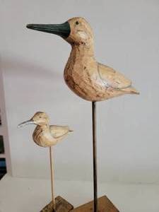 lot 33 image: Pair of Tall Carved Sand Crane Bird Statues