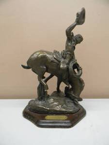 lot 8 image: The Bucker and the Buckeroo Sculpture - By C.M. RUSSELL Chesapeake Reproductions INC. - FANTASTIC PIECE  - APPROX 14 By 9 - SEE PICTURES