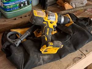 lot 108 image: DeWalt 12 20V HammerdrillDrill Driver DCD999 with Tool Bag