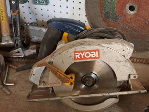 lot 121 image: Ryobi 7-14 Circular Saw CSB141LZ