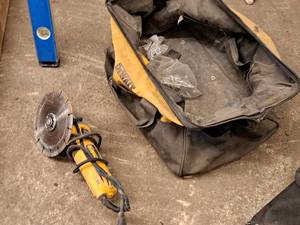 lot 144 image: DeWalt 4-12 Angle Grinder DWE4011 with Tool Bag