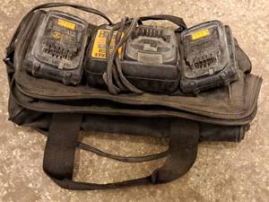 lot 146 image: 20V Cordless Tool Accessories - (2) DeWalt 20V Max Lithium Ion Batteries, (1) DeWalt 12V20V Max Lithium Ion Battery Charger DCB107 and a Tool Bag
