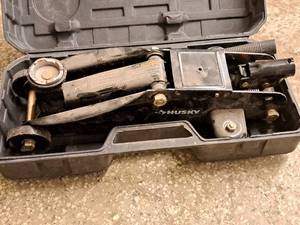 lot 152 image: Husky 2-Ton Hydraulic Trolley Jack with Case