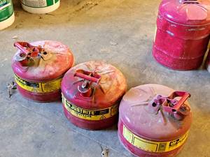 lot 83 image: Lot of (3) 2.5-Gallon Metal Gas Cans