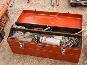 lot 195 image: Popular Mechanics 24 Metal Tool Box with Tool Tray, Milwaukee 1-38 Wrench, Air Chucks, Misc. Hardware, Duct Tape