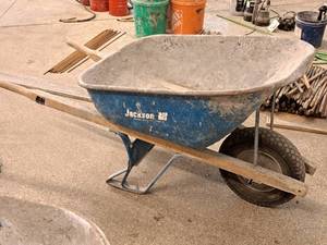 lot 69 image: Jackson Professional Tools Wood HandleMetal Wheelbarrow