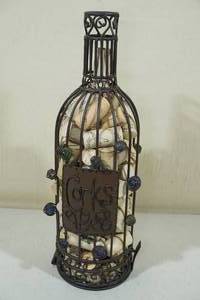 lot 216 image: Bottle Shaped Metal Cork Container