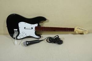 lot 210 image: Xbox 360 Rock Band Wireless Guitar with Mic