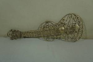 lot 126 image: Metal Art Deco Guitar Wall Art