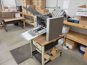 lot 44 image: O&M Folding Machine Model No. 1117FM