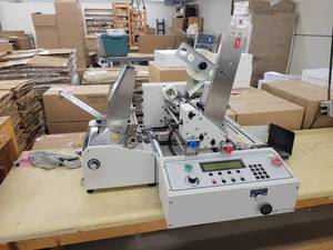 lot 28 image: HASLER Model No. HT25 Multi Side Tabber and Stamp Affixer with Manual