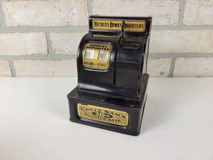 lot 476 image: Vintage Uncle Sams 3-Coin Register Bank - Opens up every $10 Deposited