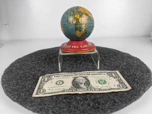 lot 558 image: Vintage Ohio Art Tin Litho Globe Coin Bank