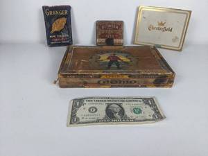 lot 551 image: Collection of Vintage & Antique Tobacco Products - Granger Pouch, Chesterfield Cigarette Tin, Between the Acts Little Cigar Tin, and Cremo Cigar Box