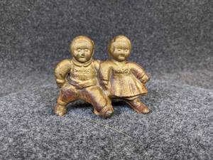 lot 504 image: Antique AC Williams Campbells Kids Cast Iron Coin Bank  Still Bank