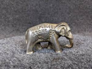 lot 497 image: Antique Independent Stove Co. Cast Iron Advertising Elephant - Owsso, MI