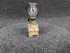 lot 501 image: Vintage Lemberger Food Co. Glass Oil Lamp Candy Dispenser