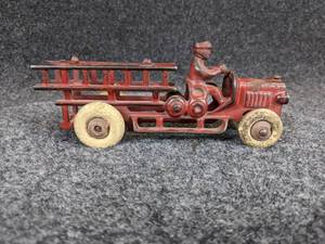 lot 496 image: Antique Cast Iron Fire Truck with Driver