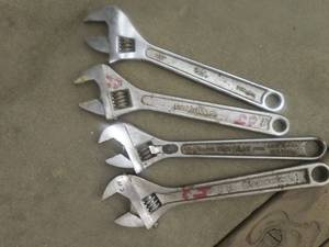 lot 99 image: 4) 12 WRENCHES.