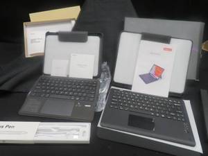 lot 105 image: 2 BRAND NEW  IPAD TOUCHPAD KEYBOARDS WITH CASES