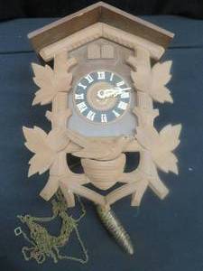 lot 121 image: VINTAGE CUCKOO CLOCK