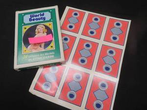 lot 159 image: SHEET OF UNCUT RISQUE PLAYING CARDS  OVERSIZED PACK OF RISQUE CARDS