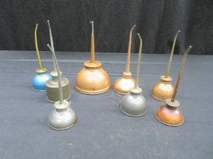 lot 162 image: 8 VINTAGE LITTLE OIL CANS