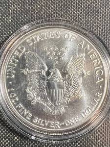 lot 09 image: 1988 AMERICAN SILVER EAGLE IN AIRTITE