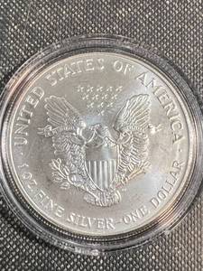 lot 21 image: 1993 AMERICAN SILVER EAGLE IN AIRTITE