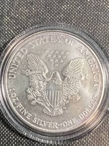 lot 47 image: 2002 AMERICAN SILVER EAGLE IN AIRTITE