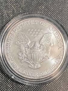 lot 49 image: 2003 AMERICAN SILVER EAGLE IN AIRTITE