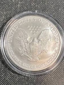 lot 54 image: 2005 AMERICAN SILVER EAGLE IN AIRTITE