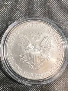 lot 57 image: 2006 AMERICAN SILVER EAGLE IN AIRTITE